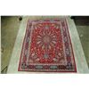 Image 2 : A WOOL HAND KNOTTED FLORAL ORIENTAL AREA RUG.