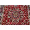 Image 4 : A WOOL HAND KNOTTED FLORAL ORIENTAL AREA RUG.
