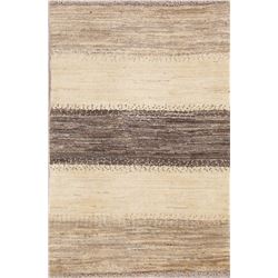A WOOL HAND KNOTTED GABBEH ORIENTAL AREA RUG.