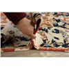 Image 12 : A WOOL HAND KNOTTED ORIENTAL AREA RUG.
