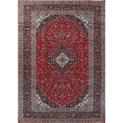 A WOOL HAND KNOTTED ORIENTAL AREA RUG.