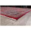Image 11 : A WOOL HAND KNOTTED FLORAL ORIENTAL AREA RUG.