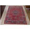 Image 2 : A WOOL HAND KNOTTED FLORAL ORIENTAL AREA RUG.