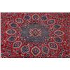 Image 4 : A WOOL HAND KNOTTED FLORAL ORIENTAL AREA RUG.
