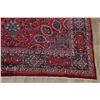 Image 6 : A WOOL HAND KNOTTED FLORAL ORIENTAL AREA RUG.