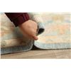 Image 12 : A WOOL HAND KNOTTED FLORAL TURKISH AREA RUG.