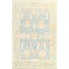 Image 1 : A WOOL HAND KNOTTED FLORAL TURKISH AREA RUG.