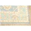 Image 6 : A WOOL HAND KNOTTED FLORAL TURKISH AREA RUG.