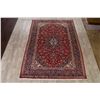 Image 2 : A WOOL HAND KNOTTED FLORAL ORIENTAL AREA RUG.