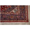 Image 6 : A WOOL HAND KNOTTED FLORAL ORIENTAL AREA RUG.