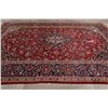 Image 9 : A WOOL HAND KNOTTED FLORAL ORIENTAL AREA RUG.