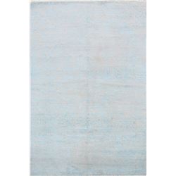 A WOOL HAND KNOTTED DAMASK ORIENTAL AREA RUG.