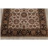 Image 5 : A WOOL HAND KNOTTED FLORAL ORIENTAL AREA RUG.