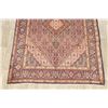 Image 5 : A WOOL HAND KNOTTED ORIENTAL AREA RUG.