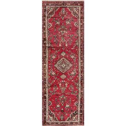 A WOOL HAND KNOTTED HALLWAY ORIENTAL RUG RUNNER.