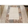 Image 2 : A WOOL HAND KNOTTED FLORAL TURKISH AREA RUG.