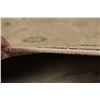 Image 12 : A WOOL HAND KNOTTED FLORAL ORIENTAL AREA RUG.