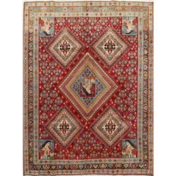 A WOOL HAND KNOTTED PICTORIAL AREA RUG.