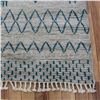Image 6 : A WOOL HAND KNOTTED MOROCCAN AREA RUG.