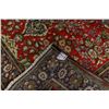 Image 10 : A WOOL HAND KNOTTED FLORAL ORIENTAL AREA RUG.