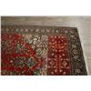 Image 12 : A WOOL HAND KNOTTED FLORAL ORIENTAL AREA RUG.