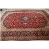 Image 12 : A WOOL HAND KNOTTED FLORAL ORIENTAL AREA RUG.