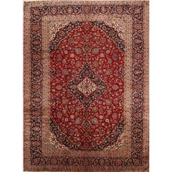 A WOOL HAND KNOTTED FLORAL ORIENTAL AREA RUG.