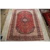 Image 2 : A WOOL HAND KNOTTED FLORAL ORIENTAL AREA RUG.