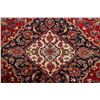 Image 3 : A WOOL HAND KNOTTED FLORAL ORIENTAL AREA RUG.