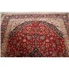 Image 4 : A WOOL HAND KNOTTED FLORAL ORIENTAL AREA RUG.
