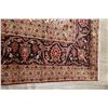 Image 5 : A WOOL HAND KNOTTED FLORAL ORIENTAL AREA RUG.