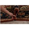Image 12 : A WOOL HAND KNOTTED MEDALLION AREA RUG.