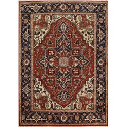 A WOOL HAND KNOTTED MEDALLION AREA RUG.