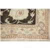Image 6 : A WOOL HAND KNOTTED FLORAL ORIENTAL AREA RUG.