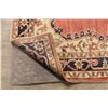 Image 10 : A WOOL HAND KNOTTED TURKISH AREA RUG.