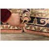 Image 12 : A WOOL HAND KNOTTED TURKISH AREA RUG.