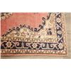 Image 9 : A WOOL HAND KNOTTED TURKISH AREA RUG.