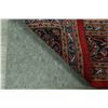 Image 10 : A WOOL HAND KNOTTED FLORAL ORIENTAL AREA RUG.