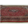 Image 9 : A WOOL HAND KNOTTED FLORAL ORIENTAL AREA RUG.
