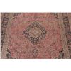 Image 4 : A WOOL HAND KNOTTED FLORAL ORIENTAL AREA RUG.
