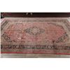 Image 9 : A WOOL HAND KNOTTED FLORAL ORIENTAL AREA RUG.