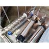 Image 2 : Electric motor, large drill bits and pneumatic cylinders