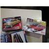 Image 2 : 4 MODEL KITS - 59 IMPALA, 61 IMPALA, 51 BELAIR AND US NAVY BOMBER PLANE