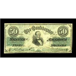 T16 $50 1861. Embossing lingers on this $50 that exhibi 