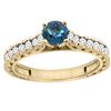 Image 1 : 0.86 CTW London Blue Topaz & Diamond Ring 14K Yellow Gold - REF-62H5M