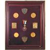 Image 1 : ROMANIA Framed set of 8 medals and one badge probably made for