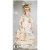 Image 1 : PORCELAIN DOLL WITH STAND