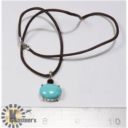 TOPAZ & GARNET IN SILVER ON BRAIDED ROPE