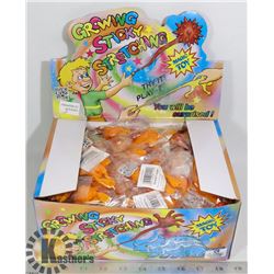 RETAIL DISPLAY OF GROWING STICKY STRETCHING MAGIC