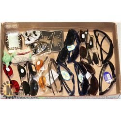 FLAT OF SUNGLASSES, BELT BUCKLES, AND YODA FIGURE